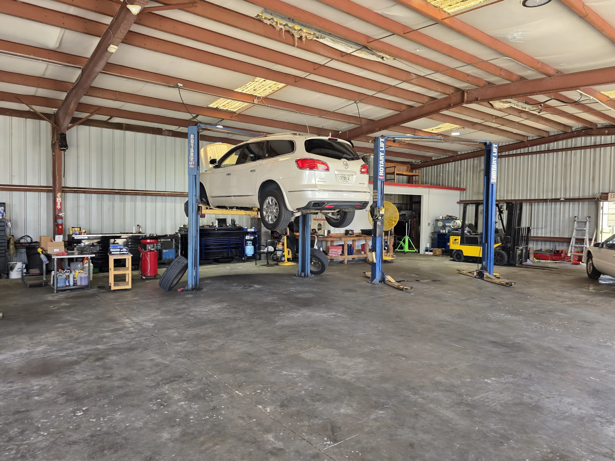 Vehicles ready for service inside Mike's Expert Auto Repair